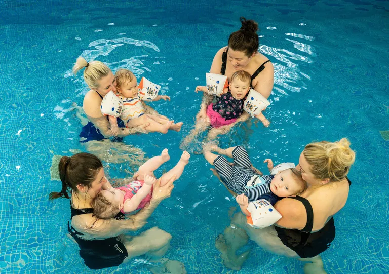 Children's swimming lesson in progress